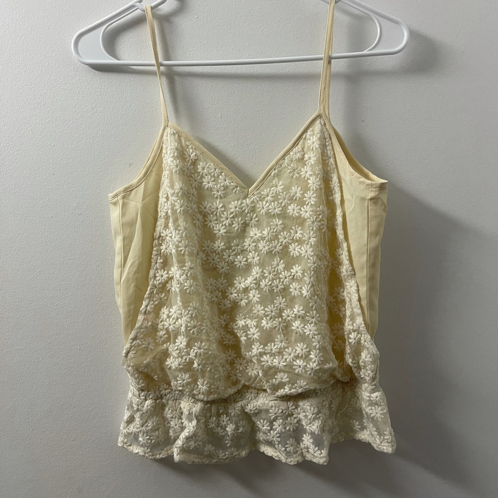 Off-white (color) top. Size s